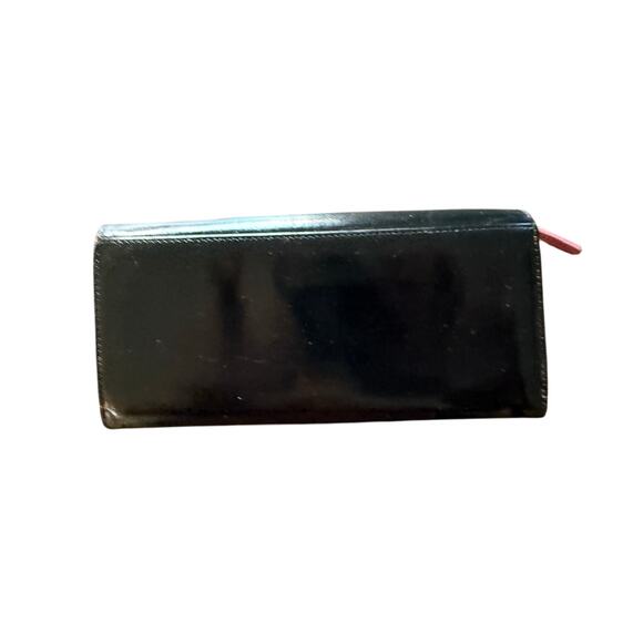 Kate Spade wallet in black leather with pink leather interior. - Picture 2 of 4